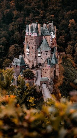 Burg Eltz im Morgengrauen by Heinrich Adolf Valentin Hoffmann (1885) & the Burg itself.