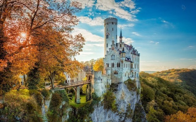 Within the Swabian Alps, is Lichtenstein Castle; commissioned by Count Wilhelm von Urach Gothic-Revival architecture blends with nature's holiness to gently foment a visage most beautiful
