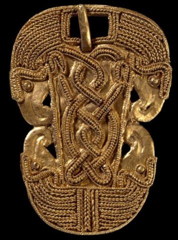 Filigree buckles from Faversham
A pair of miniature buckles is one of the best examples of filigree known from the early Anglo-Saxon period. Each buckle is cut from gold sheet which has been shaped a