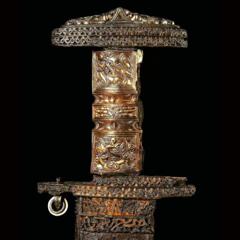 "Ornate Migration Period sword, early 500s AD. Found in a warrior's grave at the Snartemo Farm in Agder, Norway."
Note the odd pendant pair of rings.