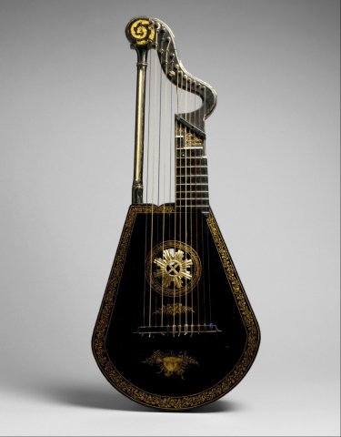 Wood, lacquered and gilded harp lute by Edward Light, 1815. The MET.