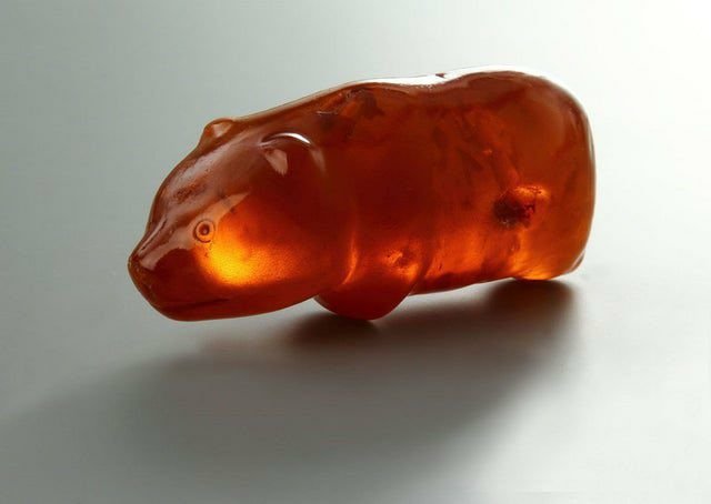 Amber bear figurine of neolithic hunter, c. 3700 years old, found in 1887 in a peat bog near Slupsk, Poland.